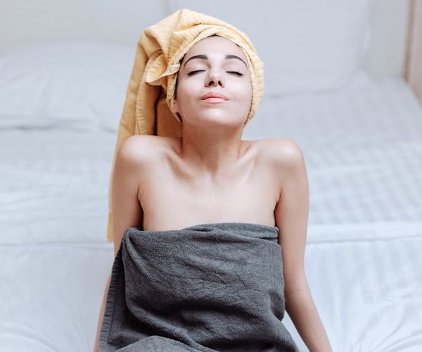 Person feeling refreshed after eye practice